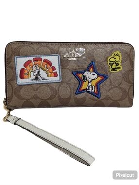 Coach X Peanuts Signature Leather Wristlet Interior with Snoopy Varsity Patchs